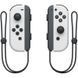 Портативна ігрова приставка Nintendo Switch OLED with White Joy-Con (045496453435) 034454 фото 5