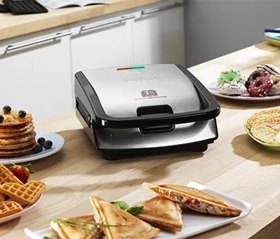 Мультимейкер (бутербродниця-вафельниця-гриль-кексниця) Tefal SW854D 134685 фото